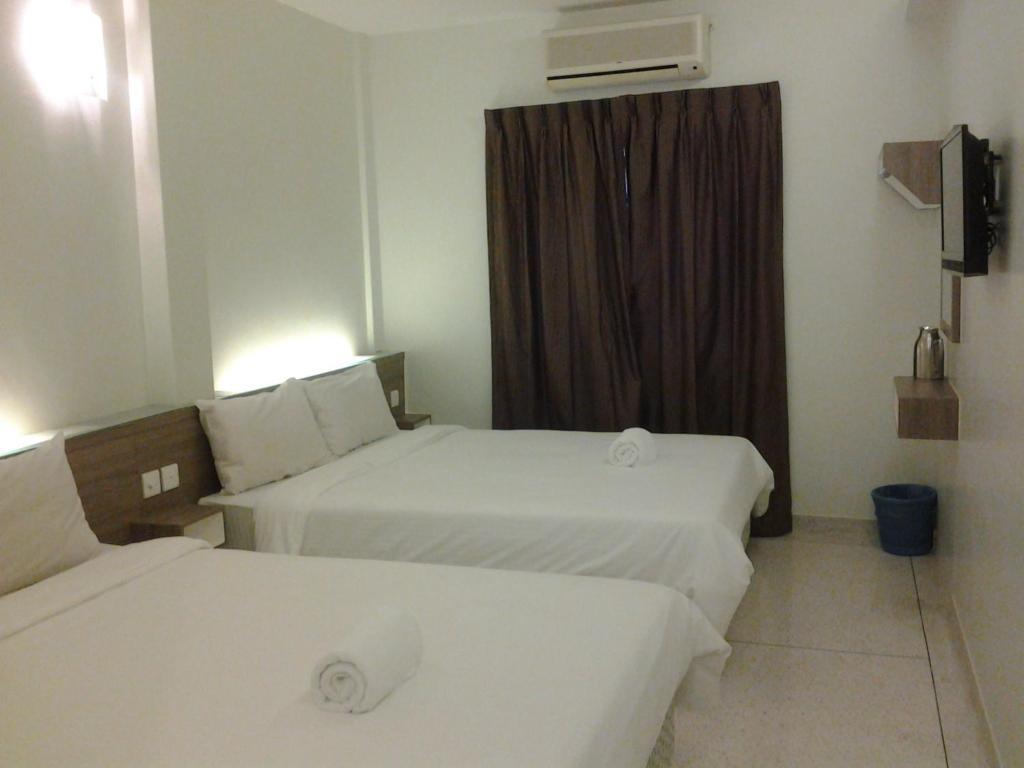 Qish Hotel Malacca Habitación foto